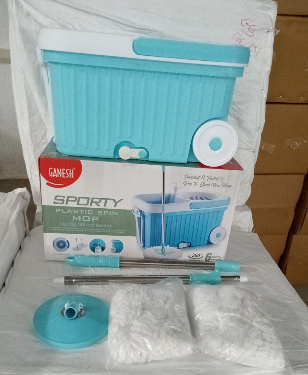 Spin mop with larger wheels for efficient cleaning Spin mop with larger wheels for efficient cleaning